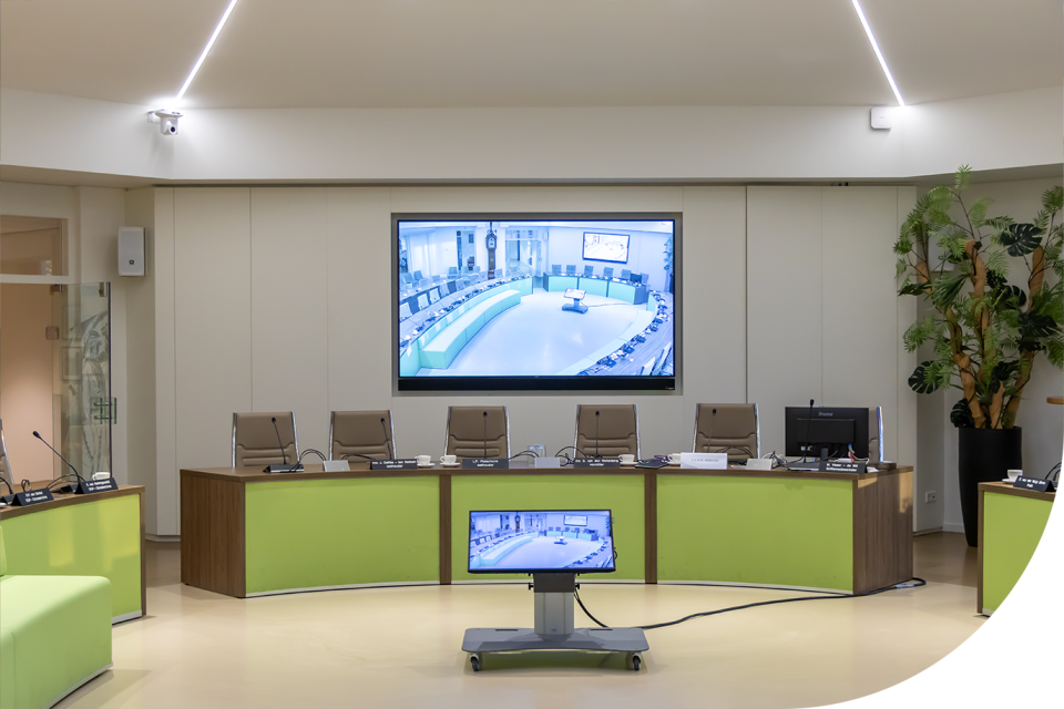 Heuvelman AV installation in a modern office environment integrated with GoBright room booking