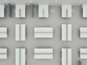 Overhead flat-lay of a minimalist open-plan office with white desks and teal and amber occupancy markers highlighting team booking patterns.